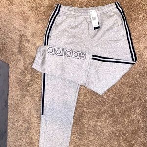 Brand New Men’s sweatpants. Gray color. Large size.